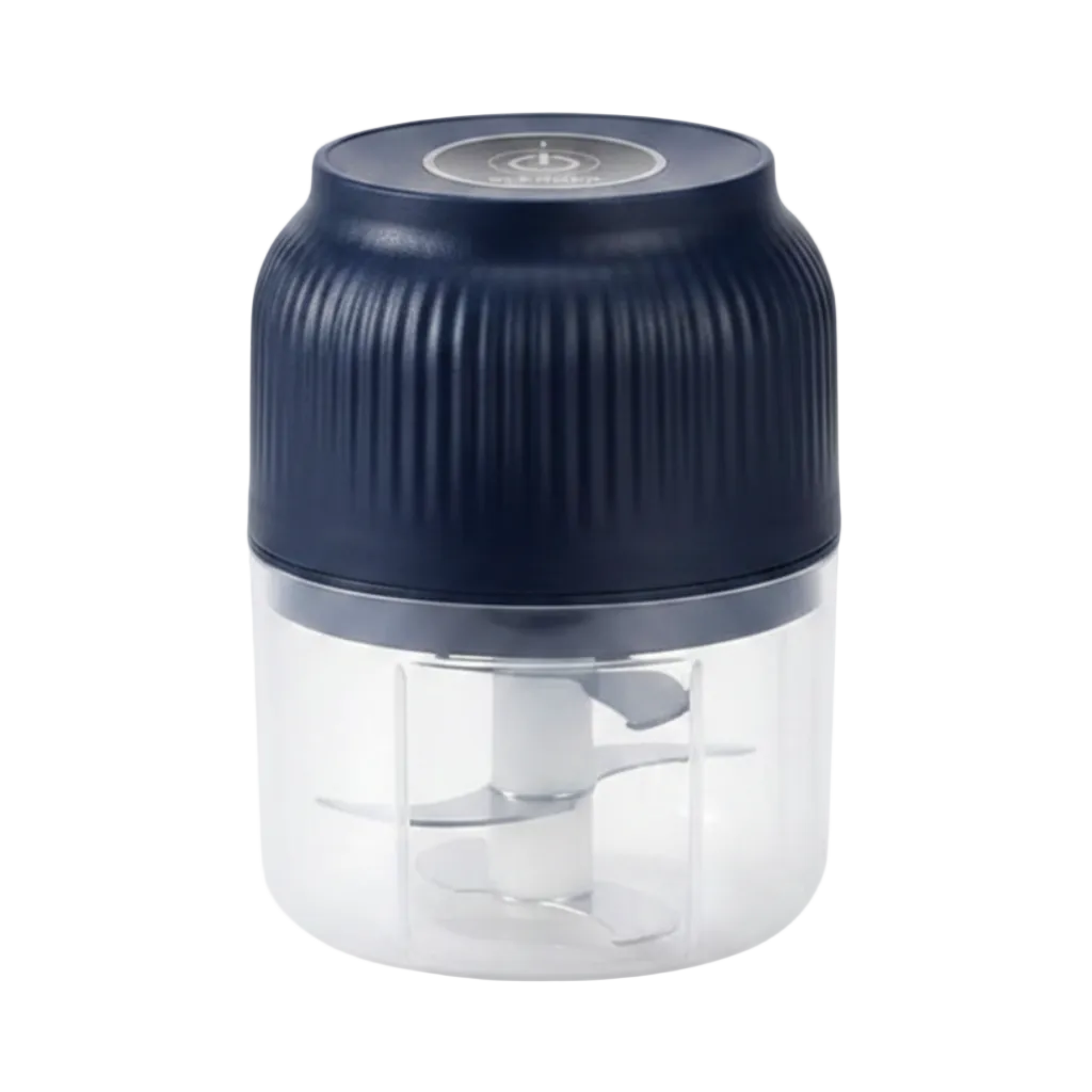 Small kitchen chopper with a dark blue top and clear base on a white background